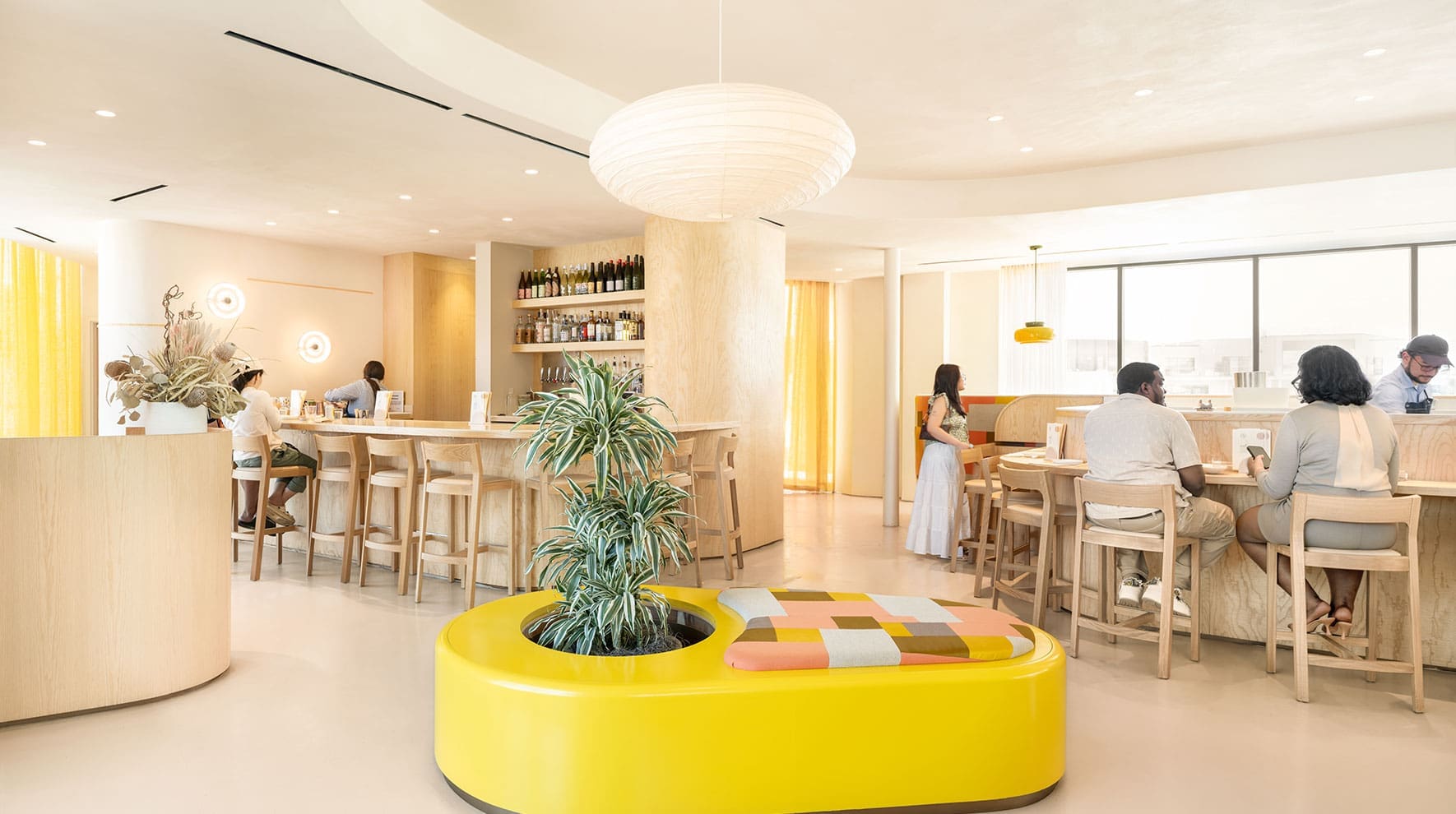 Nami Nori restaurant interior showcasing Japandi design principles, light-filled space, and strategic seating arrangements.
