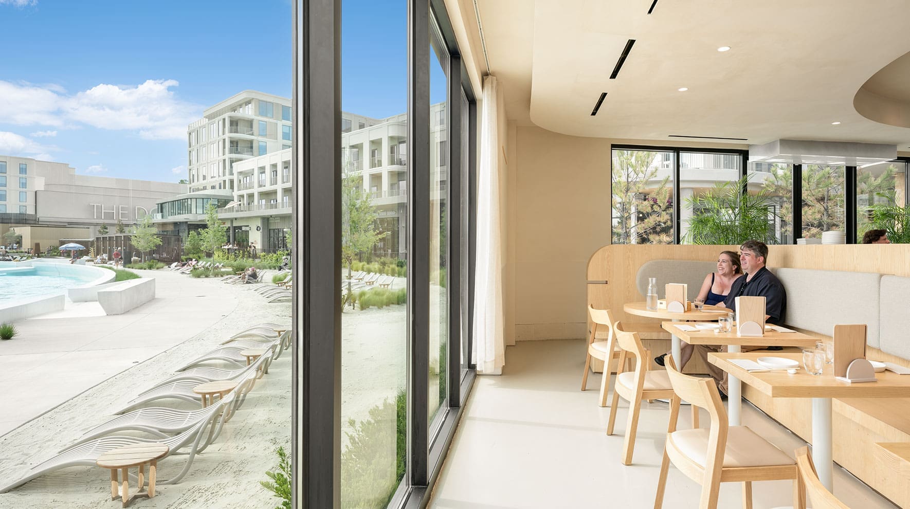 Nami Nori restaurant interior with Japandi design and surf lagoon views.